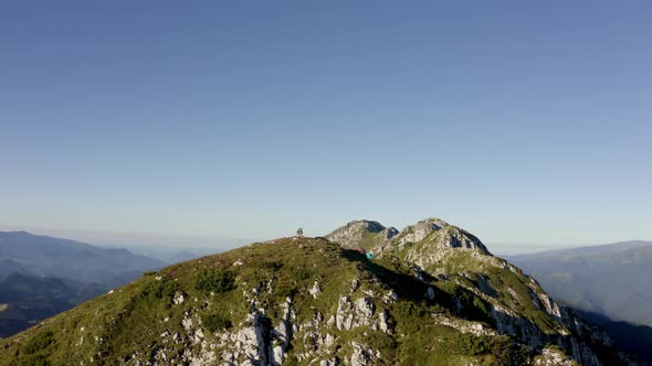 Scenic View of a Person Putting a Flag on top of the Mountain , Stock ...