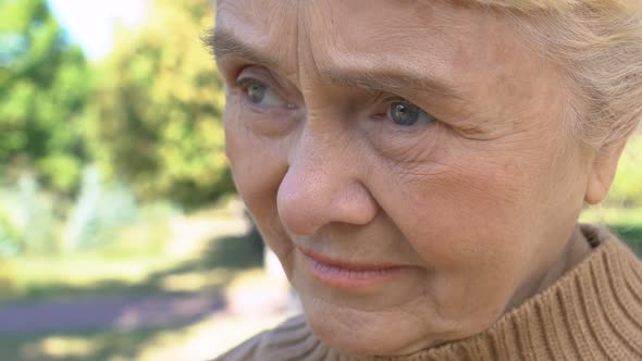 Lonely Aged Female Waiting Sitting Outdoors, Missing Children Retirement Leisure