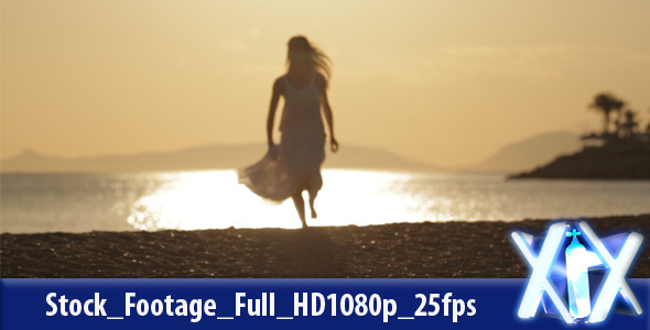 Woman Walking On Beach