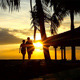 People Walking At Sunset, Next To Water House - VideoHive Item for Sale