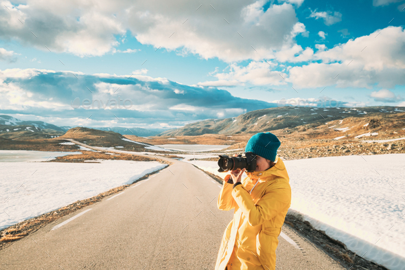 Aurlandsfjellet, Norway. Young Happy Woman Tourist Traveler Photographer Taking Pictures Photos Of - Stock Photo - Images