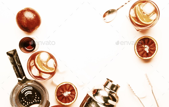 Negroni alcoholic cocktail with dry gin, red vermouth and red bitter - Stock Photo - Images