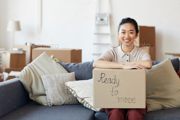 Young Asian Woman Ready to Move