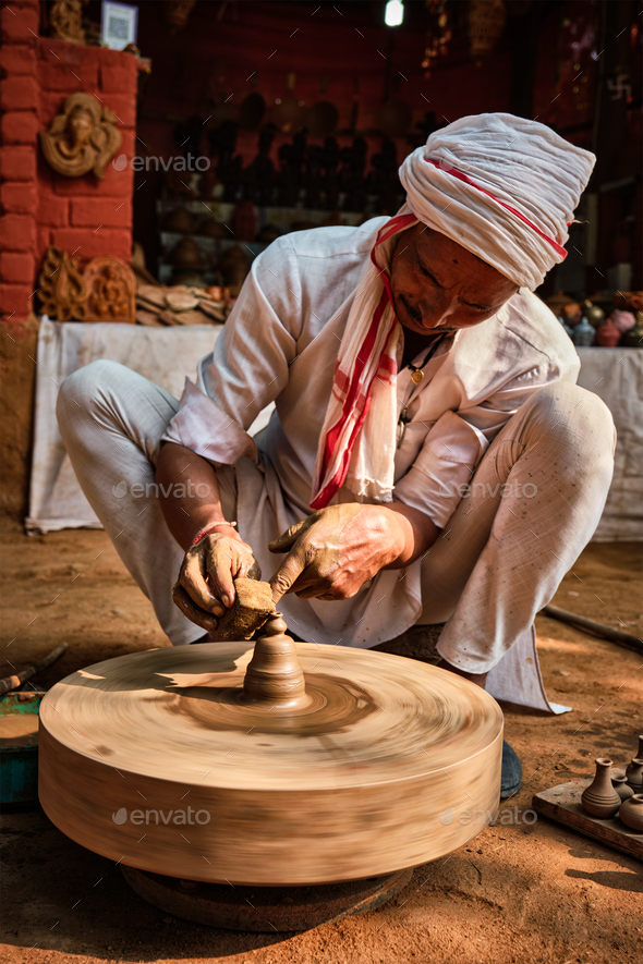Indian potter at work, Shilpagram, Udaipur, Rajasthan, India - Stock Photo - Images