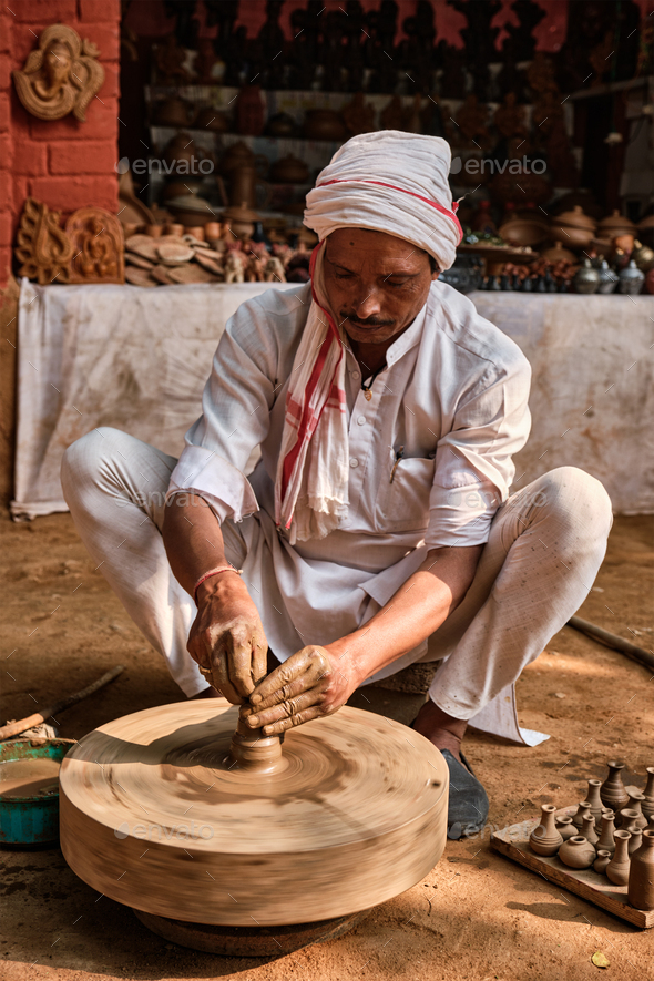 Indian potter at work, Shilpagram, Udaipur, Rajasthan, India - Stock Photo - Images