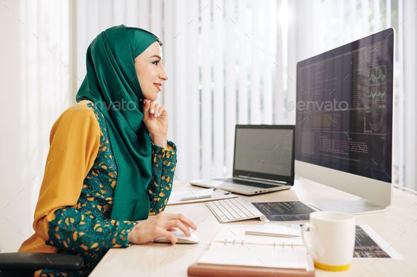 Programming muslim woman - Stock Photo - Images