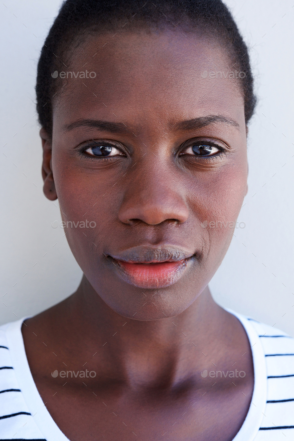 Download Close Up Beautiful Young African Woman Face With Serious Expression Stock Photo By Mimagephotography