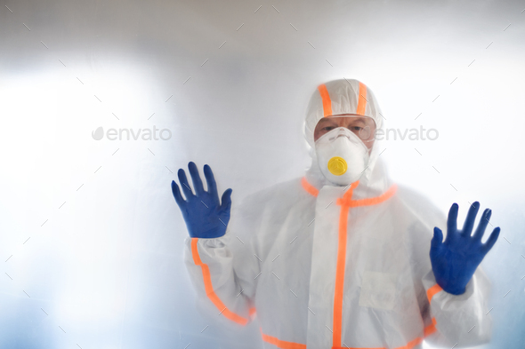 Doctor with protective suit, mask and gloves, coronavirus concept