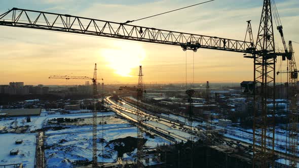 Building Machines Are Towering in the Construction Yard alt