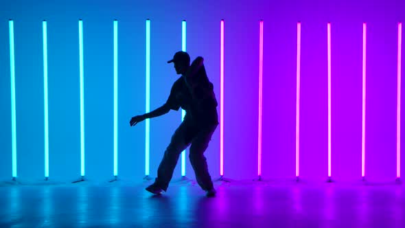 Hip Hop Dancer Performing Freestyle Dance Moves alt