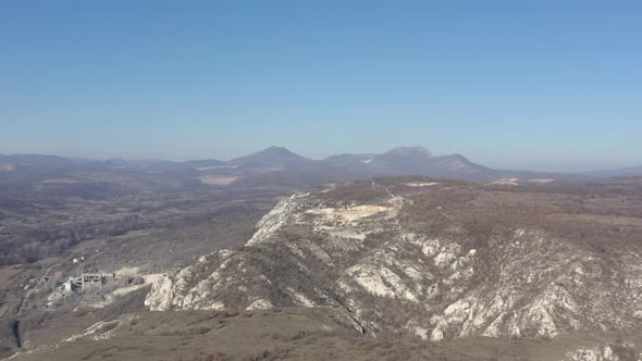 Mountains above town of Bor in Eastern Serbia 4K aerial video alt