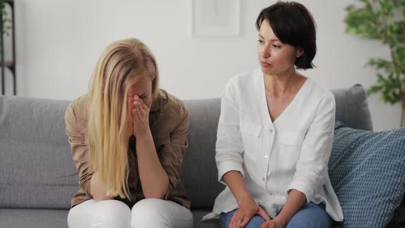 Woman Supporting Depressed Friend
