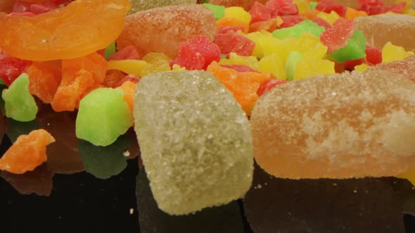 Lots of Pieces of Sugar Colored Marmalade Taken From a Close Distance alt