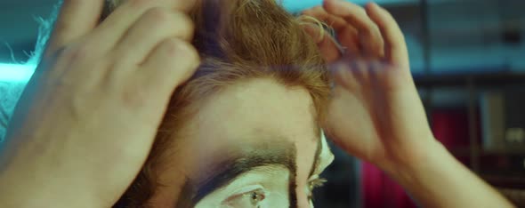 Clown Fixing Hair in Dressing Room alt