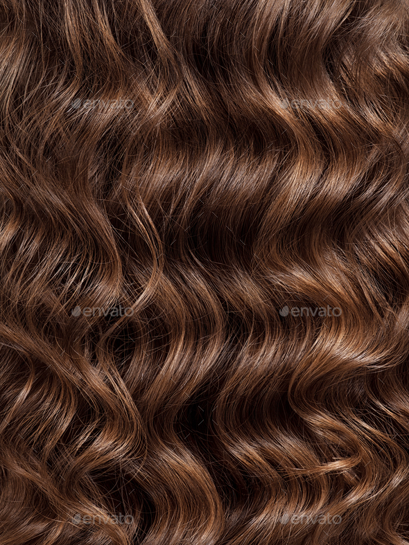 Girl with long, curly hair, rear view. Hair texture, close-up.