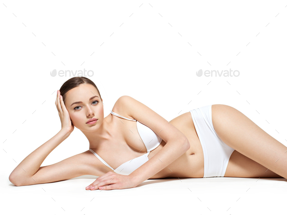 Beautiful woman with a sexy slim body. Stock Photo by valuavitaly
