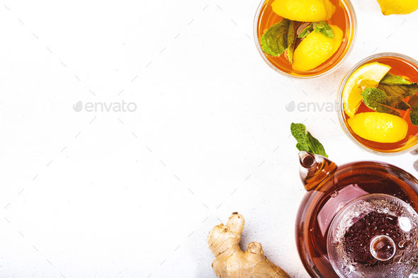 Healing black herbal tea with ginger, honey, lemon and mint