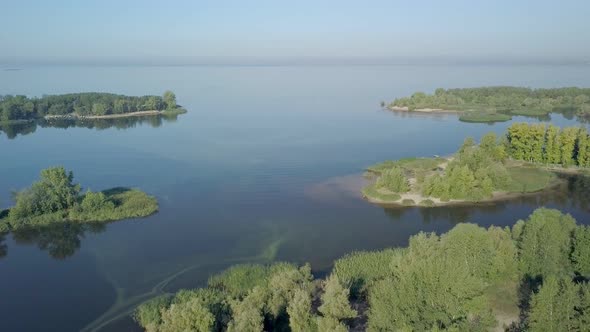 Aerial View on Landscape with Lakes, River, Forest and Coasts in Morning