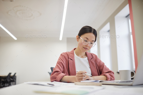Businesswoman working at her workplace