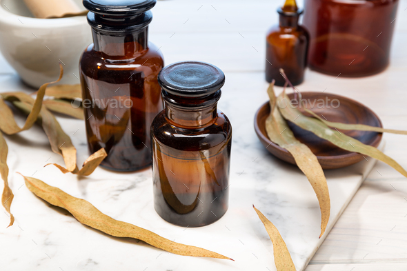 Eucalyptus essential oil on vintage amber bottle
