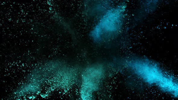 Super Slowmotion Shot of Blue Powder Explosion Isolated on Black Background at 1000Fps alt