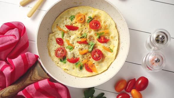 Tasty Homemade Classic Omelet with Cherry Tomatoes