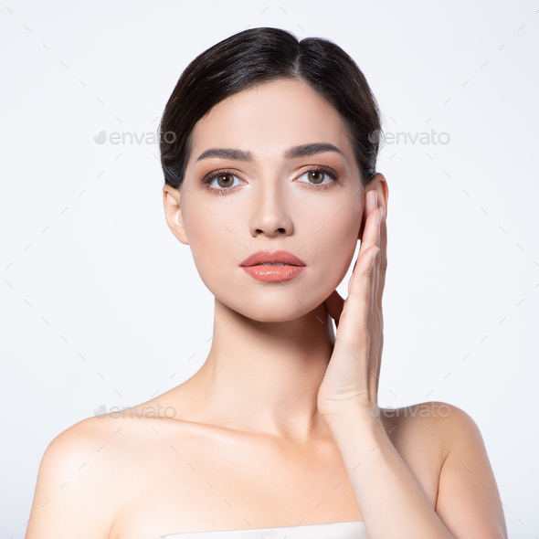 Beautiful face of young woman with health fresh skin. - Stock Photo - Images