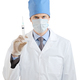 Doctor holding a syringe ready for injection - PhotoDune Item for Sale