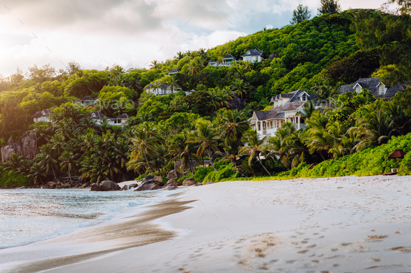 Mahe, Seychelles. Exotic tropical beach Anse Intendance in evening sunset light. Scenic view of - Stock Photo - Images