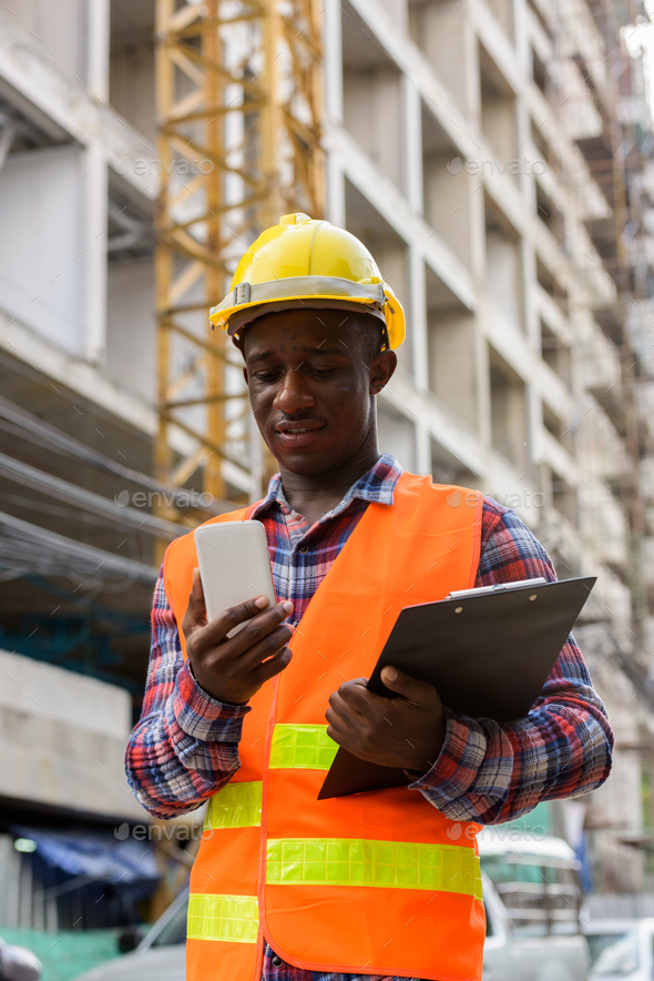 Young Happy Black African Man Construction Worker Smiling While Stock