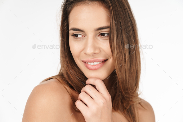 Portrait of a smiling young woman washing dishes Stock Photo by vadymvdrobot