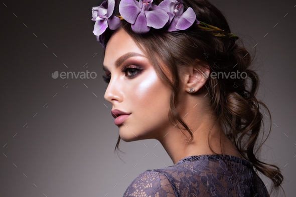 Beautiful Girl with Flowers. Pastel Colors. Perfect Face Skin - Stock Photo - Images