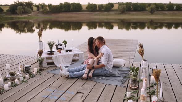 The Young Woman in Love Caresses Her Boyfriend, Romantic Movements. Cheerful Couple. alt