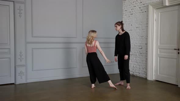 Contemporary Dance Rehearsing Man and Woman are Practicing in Rehearsal Hall alt