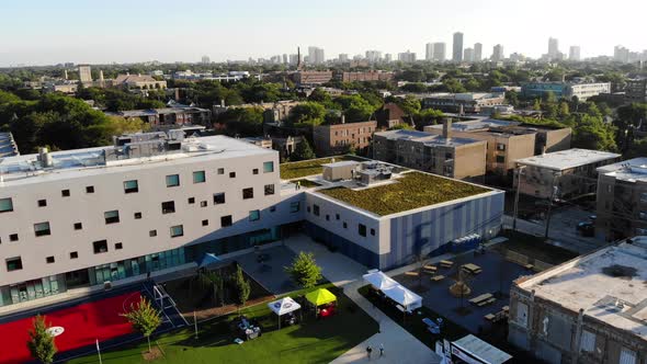 Chicago School Building Aerial View with Trees and Greenery