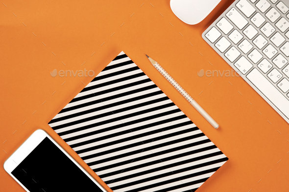 Flat Lay Top View Modern Office Desk Workspace With Notebook Computer Pencil And Mobile Phone Stock Photo By Nick Paschalis