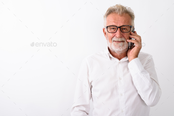 Studio Shot Of Happy Senior Bearded Man Smiling While Talking On Stock Photo By Amazingmikael photodune