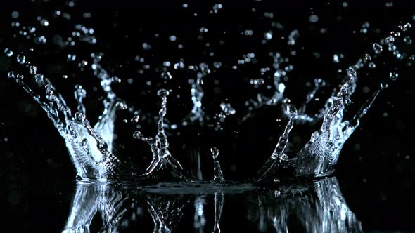 Super Slow Motion Shot of Water Crown Splash at 1000Fps Isolated on Black Background alt