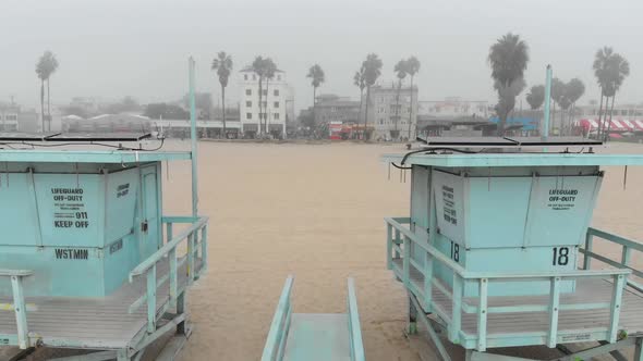 Flying between two lifeguard stands on Venice Beach, CA in a thick marine layer. alt