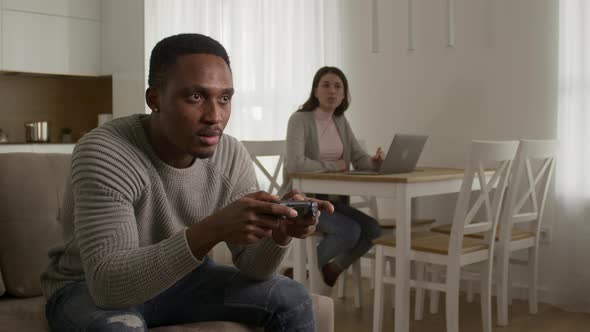 A Young Couple Arguing About Console Gaming alt