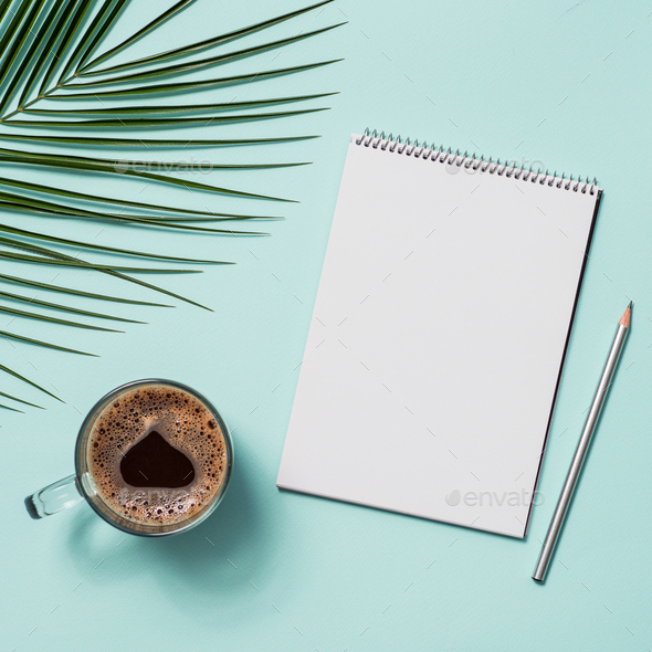 Blank paper notebook and female hands with pencil Stock Photo by Fasci