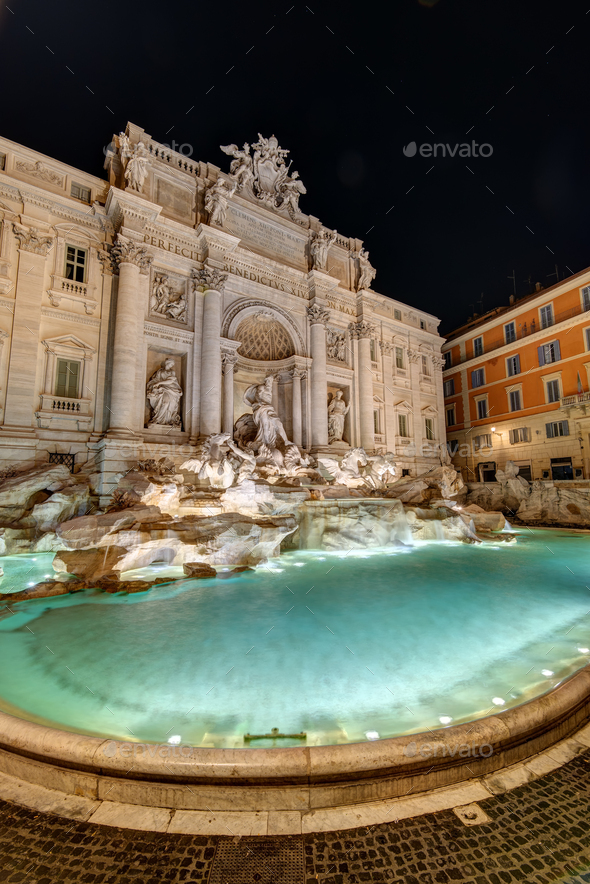 The famous Fontana di Trevi in Rome at night - Stock Photo - Images