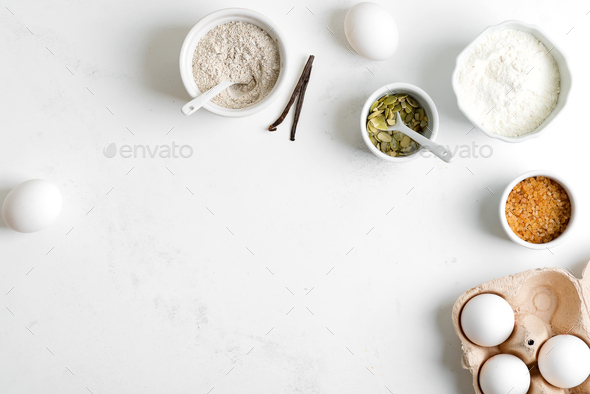 Homemade production of fresh healthy bread of other pastry from natural ingredients on a light grey - Stock Photo - Images
