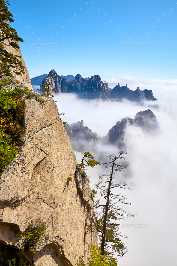 Huashan National Park mountain landscape in clouds, China. - Stock Photo - Images