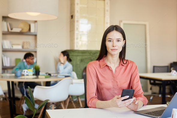 Young Female Office Worker Stock Photo by seventyfourimages | PhotoDune