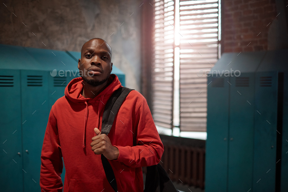 African man in locker room