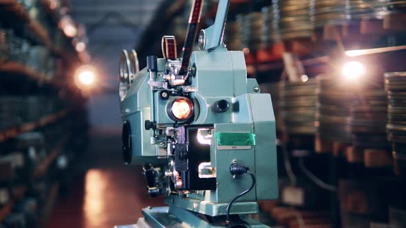 Antique Movie Projector While Demonstrating a Video alt