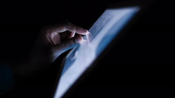 Man's Hand Working on Digital Tablet at Office Desk, Using Self Created Chart  alt