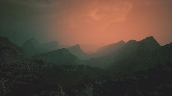 Dramatic Sky Over Rocky Mountains at Sunset alt