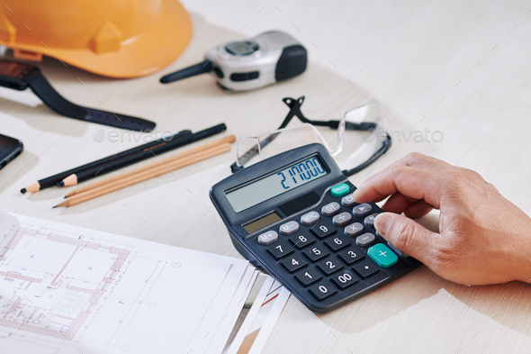 Engineer making calculations